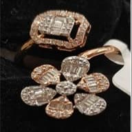 A 14K gold ring set with polki and diamonds